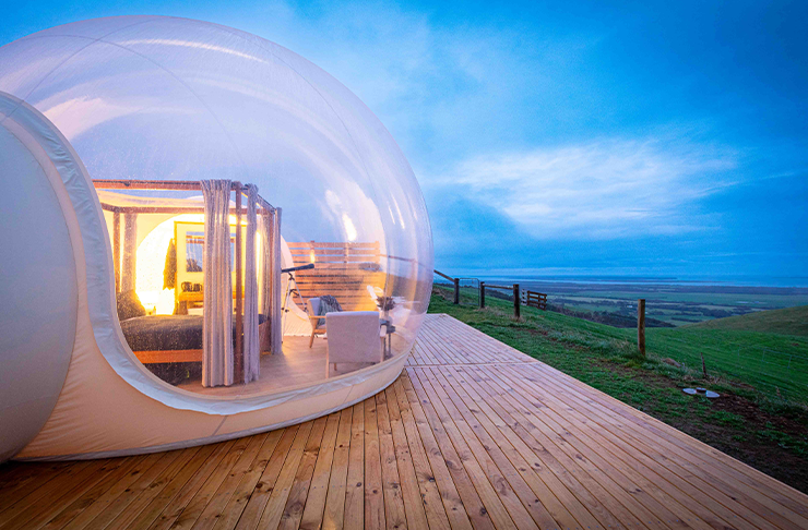 This glamping victoria option is unlike any other—a giant transparent bubble overlooking the hills at Wilson's Prom