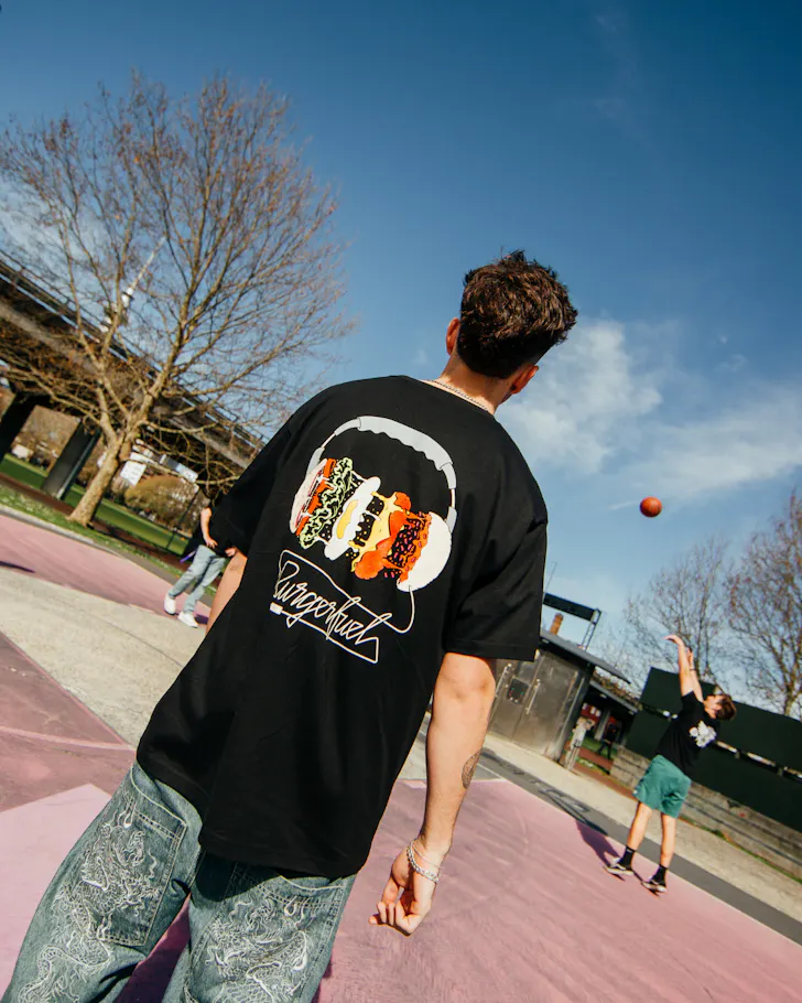 Man in Burgerfuel merch