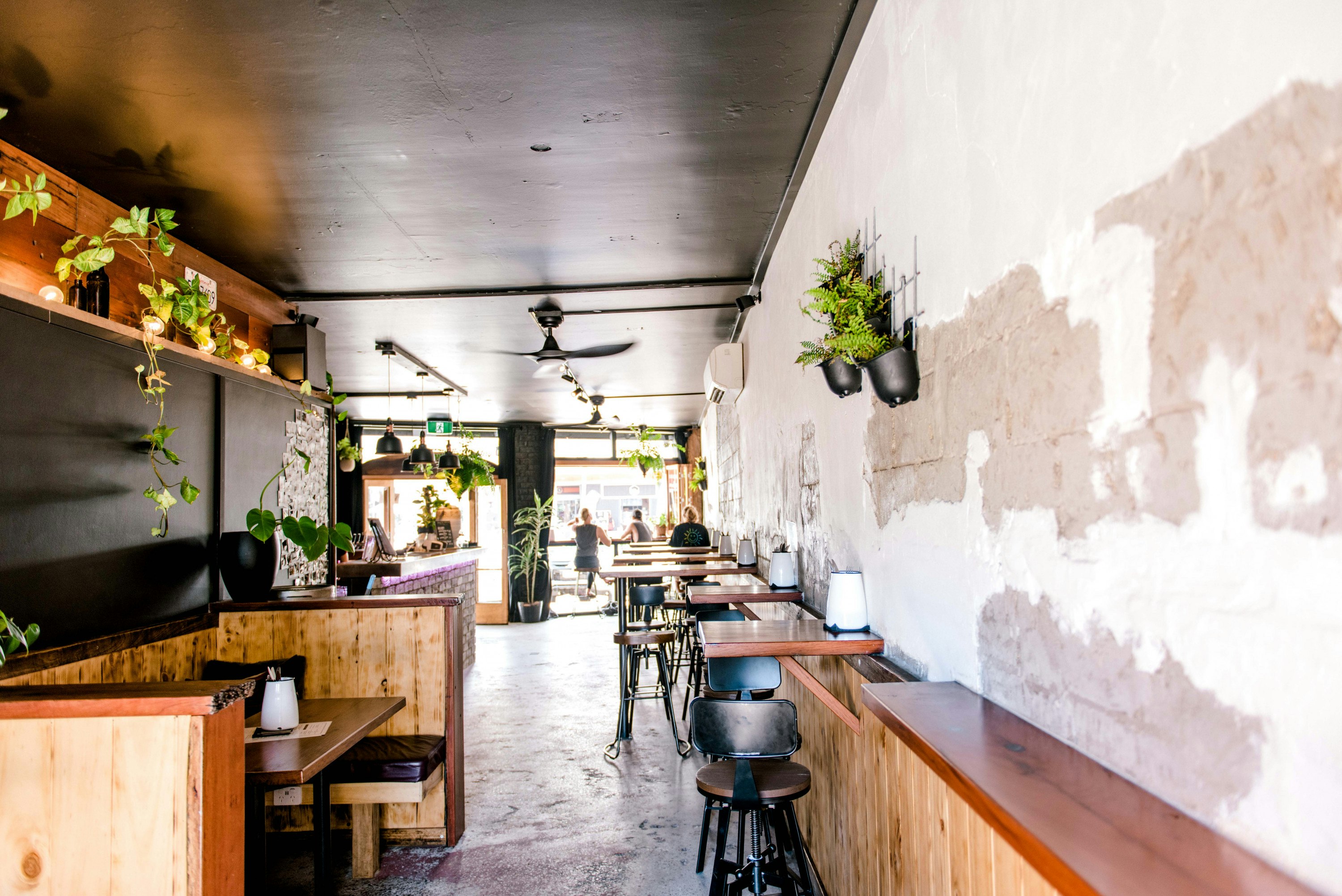 the interior of a vintage beach bar