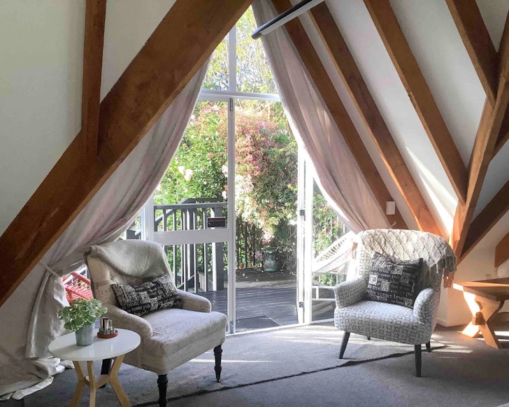 The living space at Bush And Birds best Christchurch Airbnbs