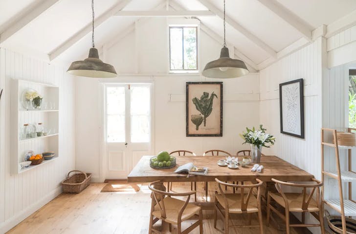 the interior of a wooden airbnb in byron