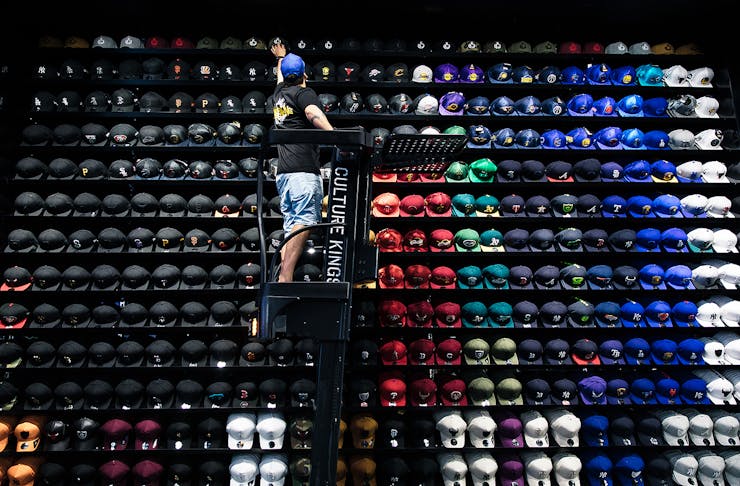 Stacks of hats at Culture Kings Melbourne.