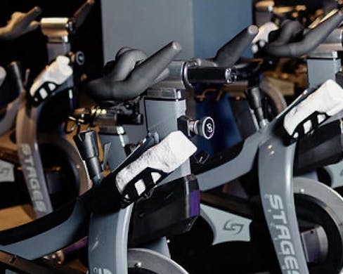 The stationery bikes at Cadence, complete with sweat towels.