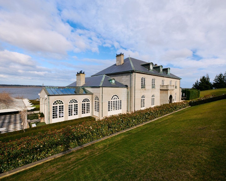 An exterior view of the impressive Campbell Point House one of the best large group stays Victoria