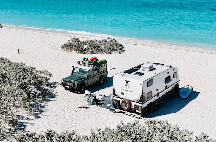 Camper van on beach.