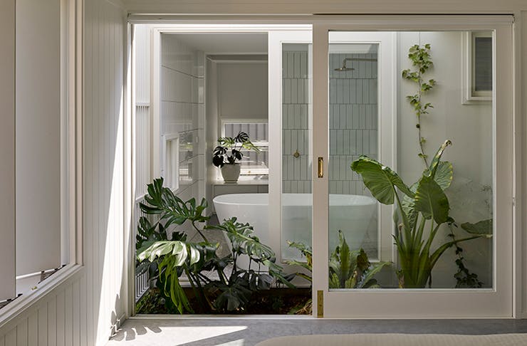 A shot of the open, light-filled bathroom of the Cantala Avenue House.