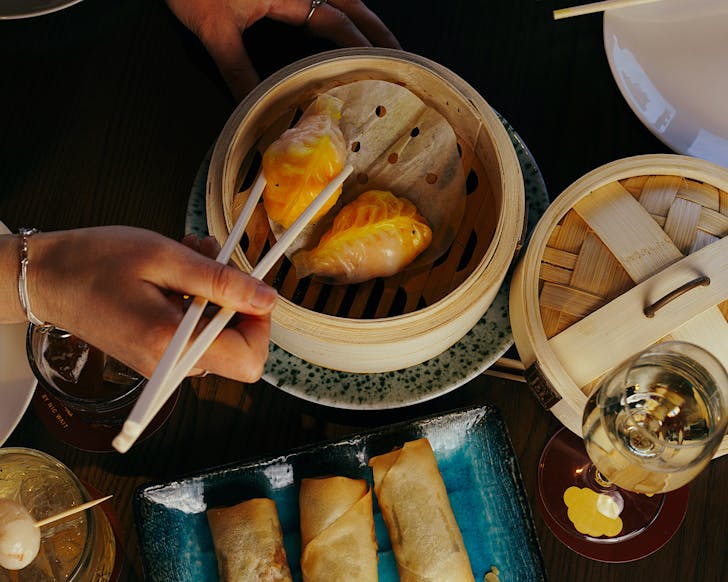 We pick up a steamed dumpling.