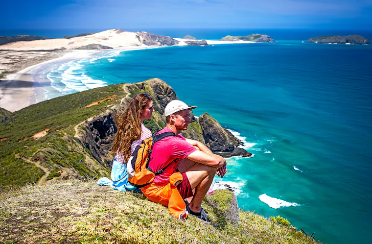 People enjoy the views in Cape Reinga.