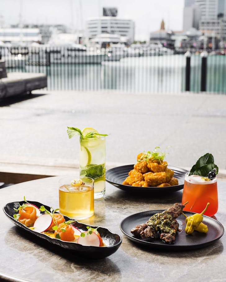 Drinks and eats with killer views at Captain's Bar, one of the best bars in Auckland. 