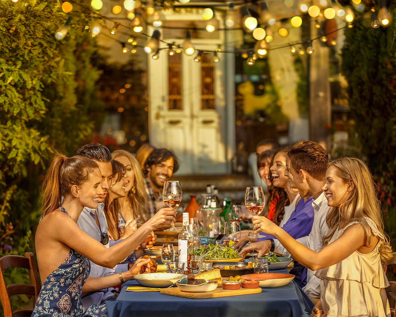 People dine outside Casito Miro, one of the best wineries in Waiheke.