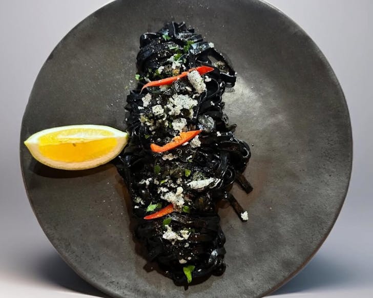 Squid ink linguine with anchovies at ChiChi Kitchen, one of the best Italian restaurants in Christchurch. 