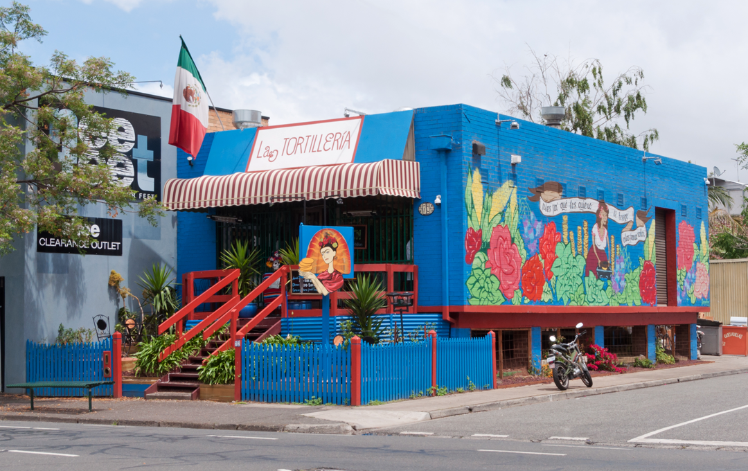 A blue painted brick building, one of the best Mexican restaurants Melbourne has.