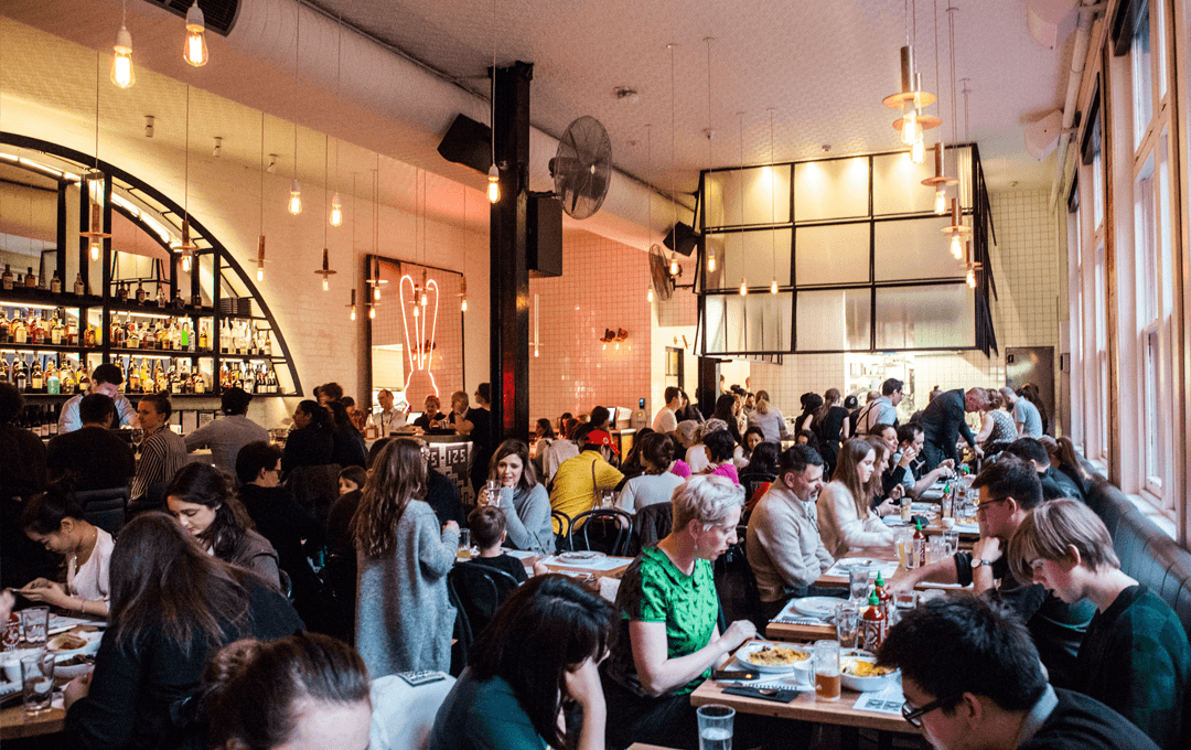 The busy dining hall of Chin Chin, a cbd melbourne restaurant.