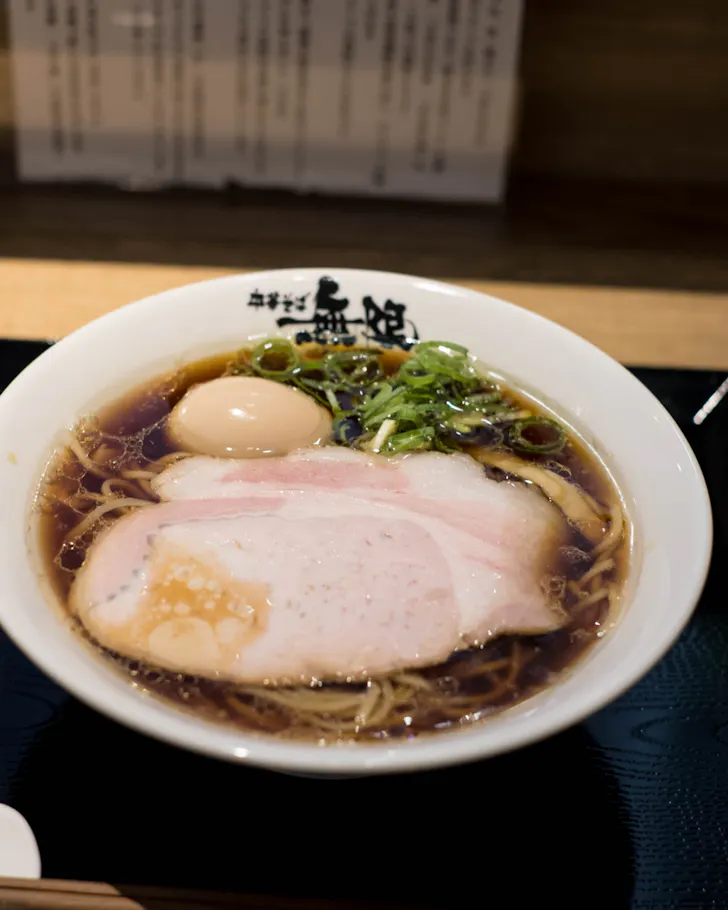 A close-up of a ramen bowl at Chukasoba Mugen in Osaka. 