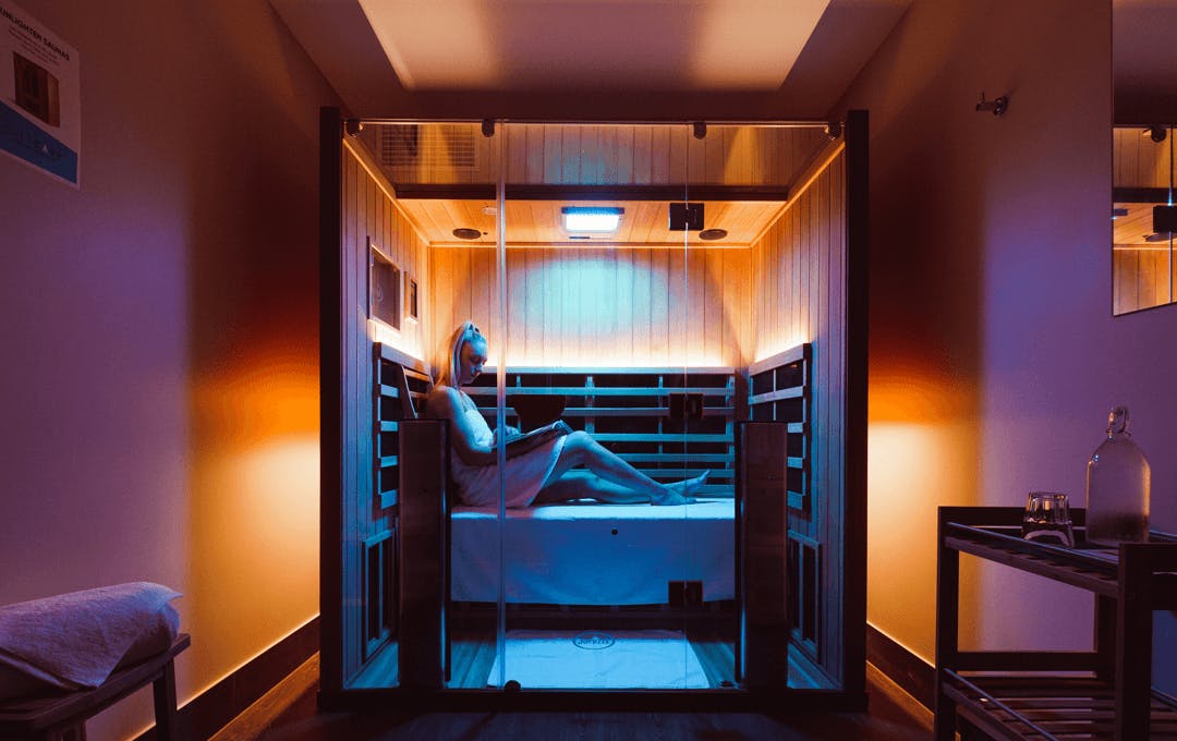 A person inside a sauna.