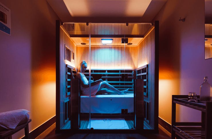 A person inside a sauna.