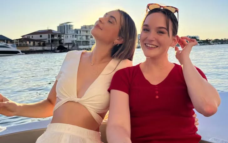 Two people smiling