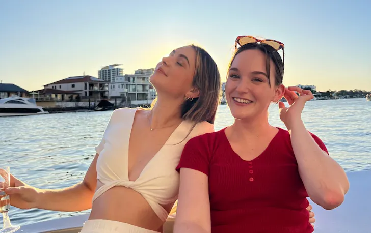 Two people smiling