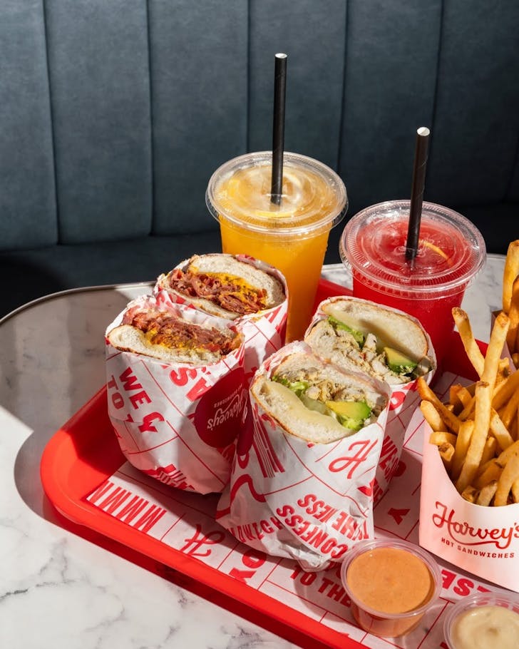 Served with stacked sandwich and refreshing cold beverage to satisfy craving