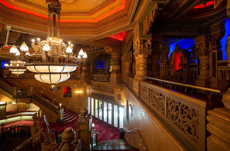 The foyer of the Civic theatre in Auckland is shown with minarets, monkeys and ornate furnishings.