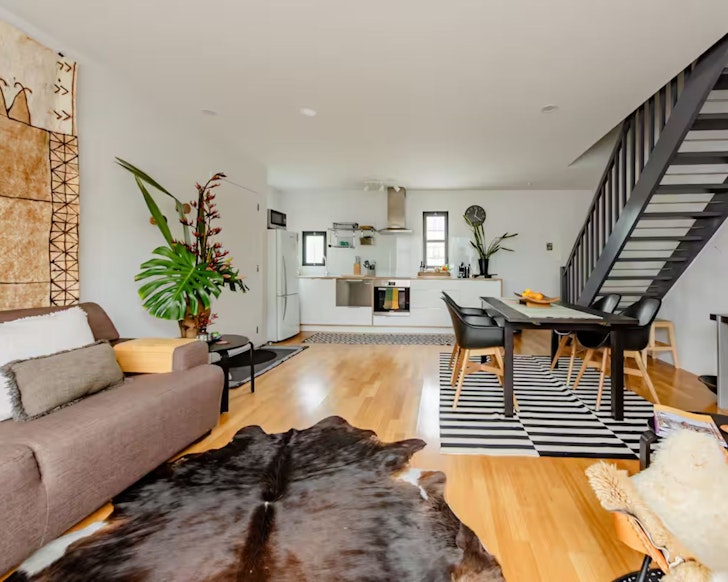 The living space at Clocktower View Apartment romantic stay in Christchurch, New Zealand