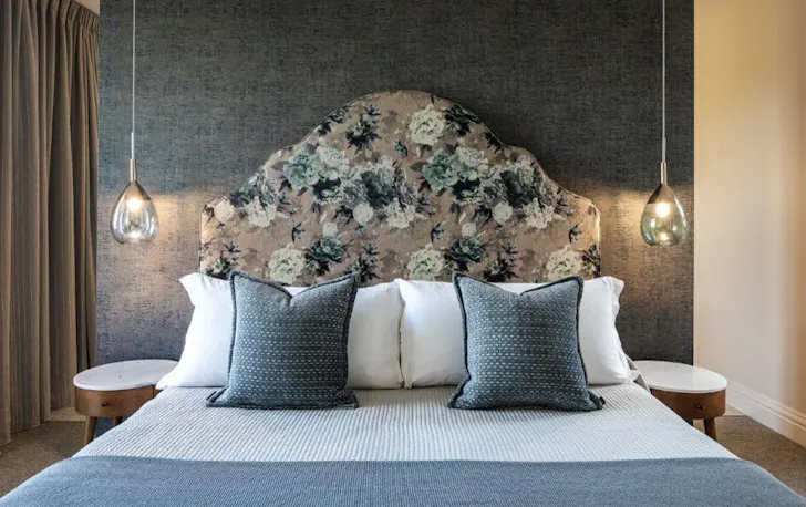 a king bed in a suite