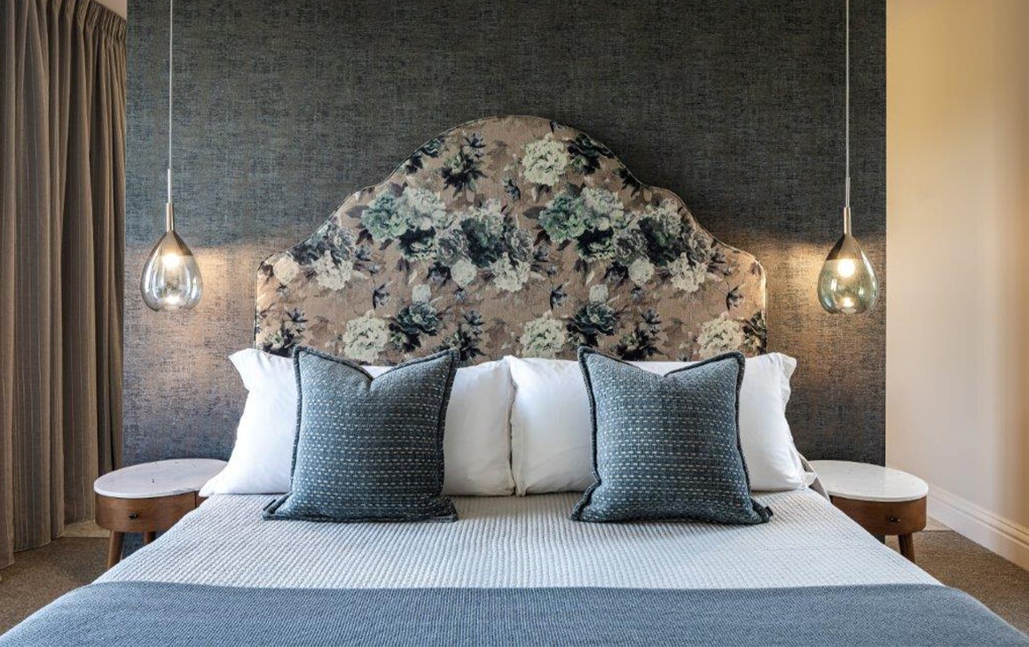 a king bed in a suite