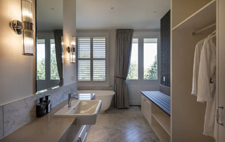 a bathroom with a freestanding tub