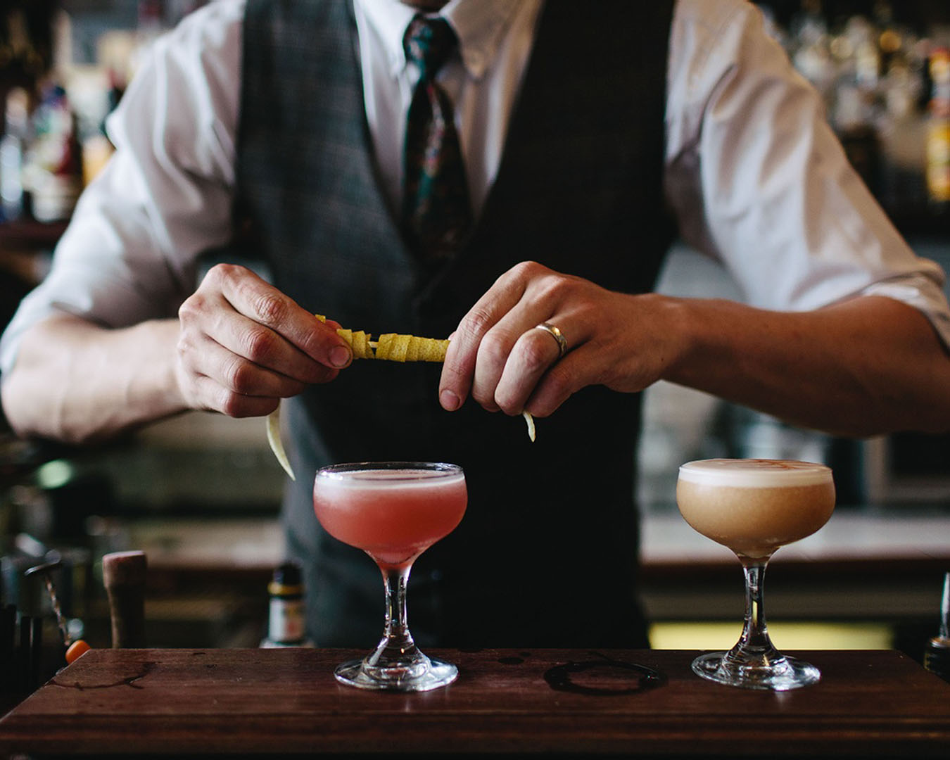 A barman prepares a cocktail at Crumpet in Wellington.
