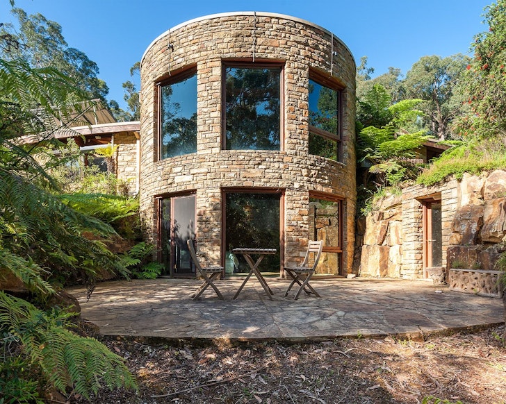 The stone exterior of Coomalie House one of the best large group Airbnbs Victoria