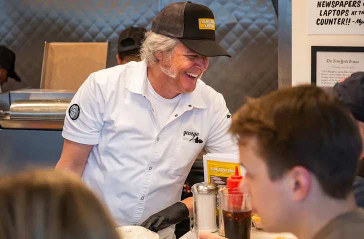 George Motz at the grill at Hamburger America