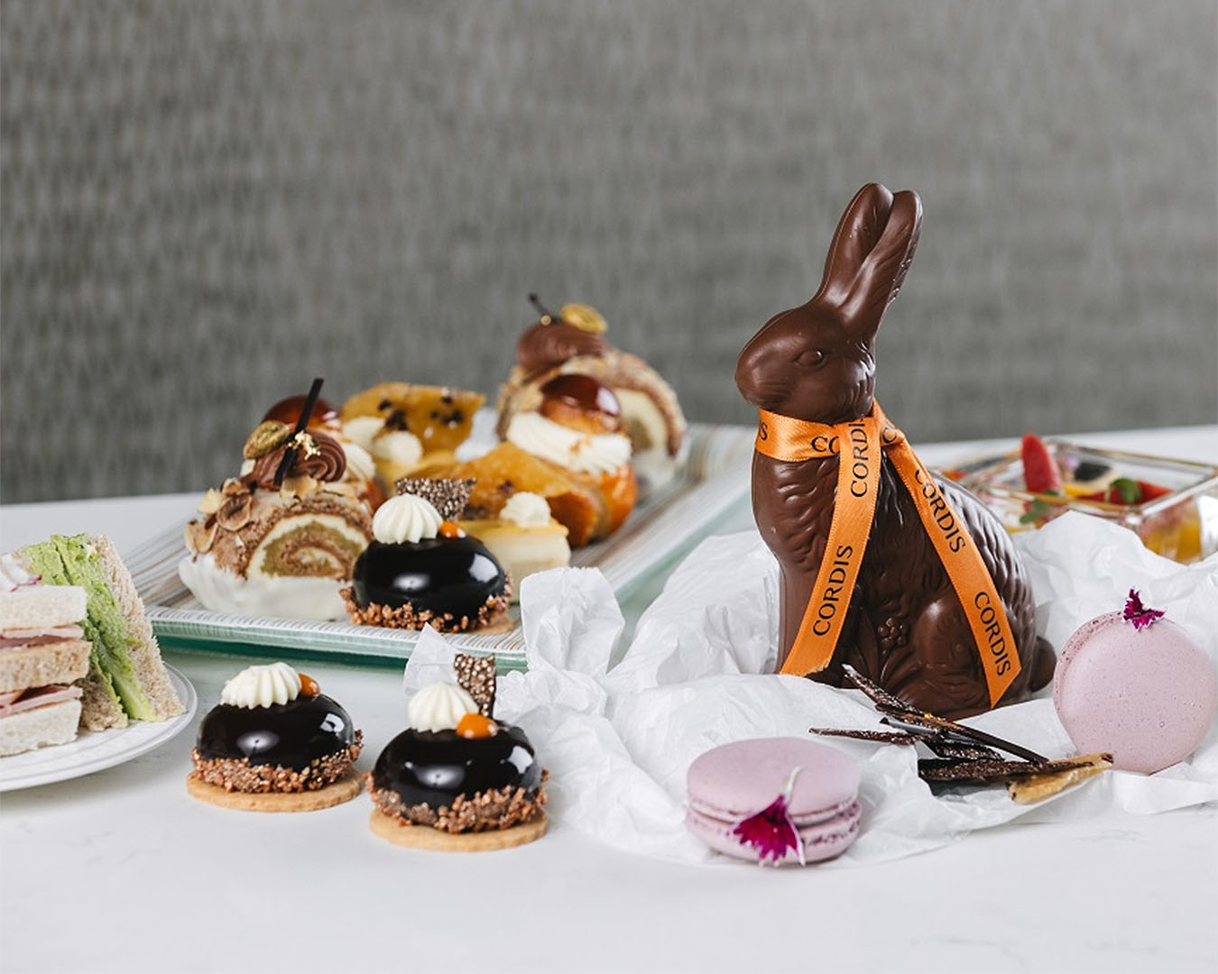 The Easter high tea at Cordis shows lots of Easter treats laid out on the table.