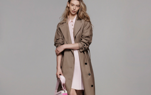 A person in a long trench coat. 