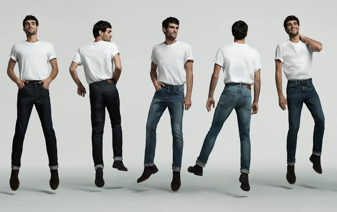 A person in different pairs of jeans. 