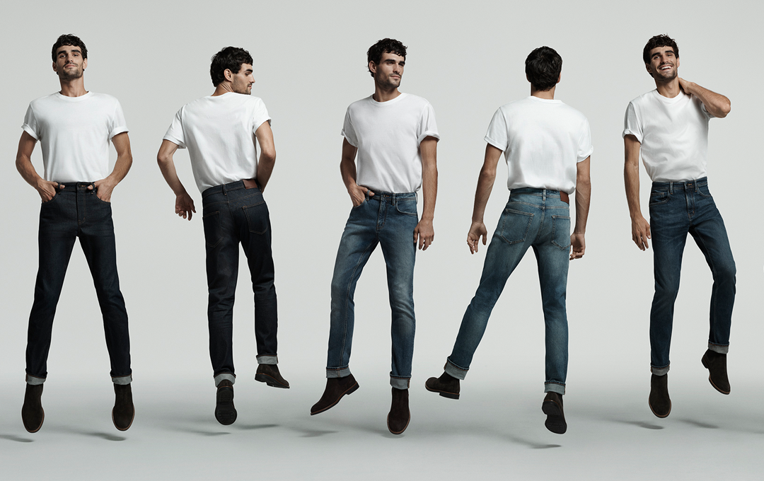 A person in different pairs of jeans. 
