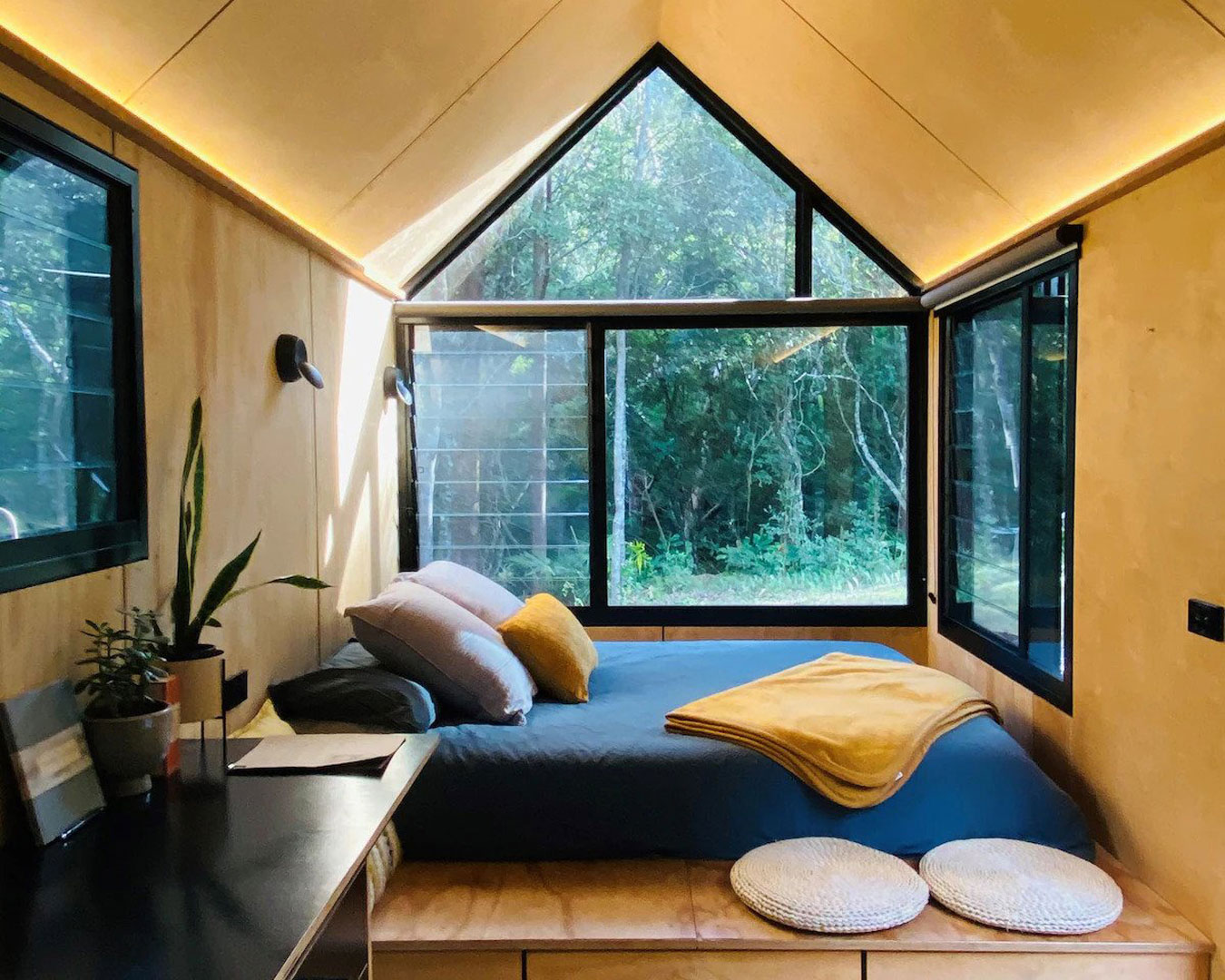 Bed in tiny house interior