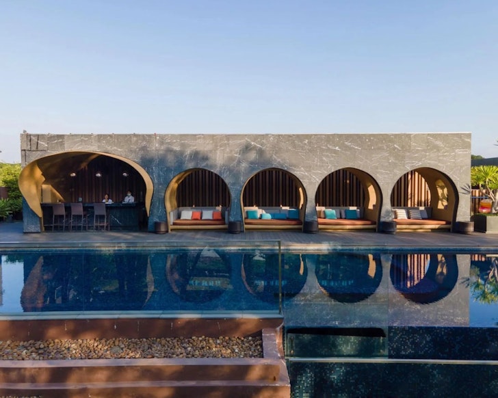 A view of the pool at Cross Chiang Mai Riverside best romantic resorts Thailand