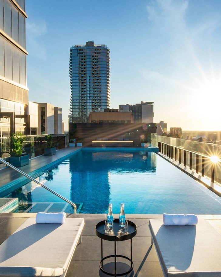 A view of the pool overlooking the city at ​Crowne Plaza Adelaide one of the best Adelaide hotels