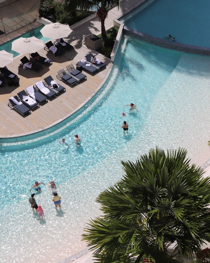A view of the rooftop pool at Crystalbrook Riley one of the best hotels in Cairns