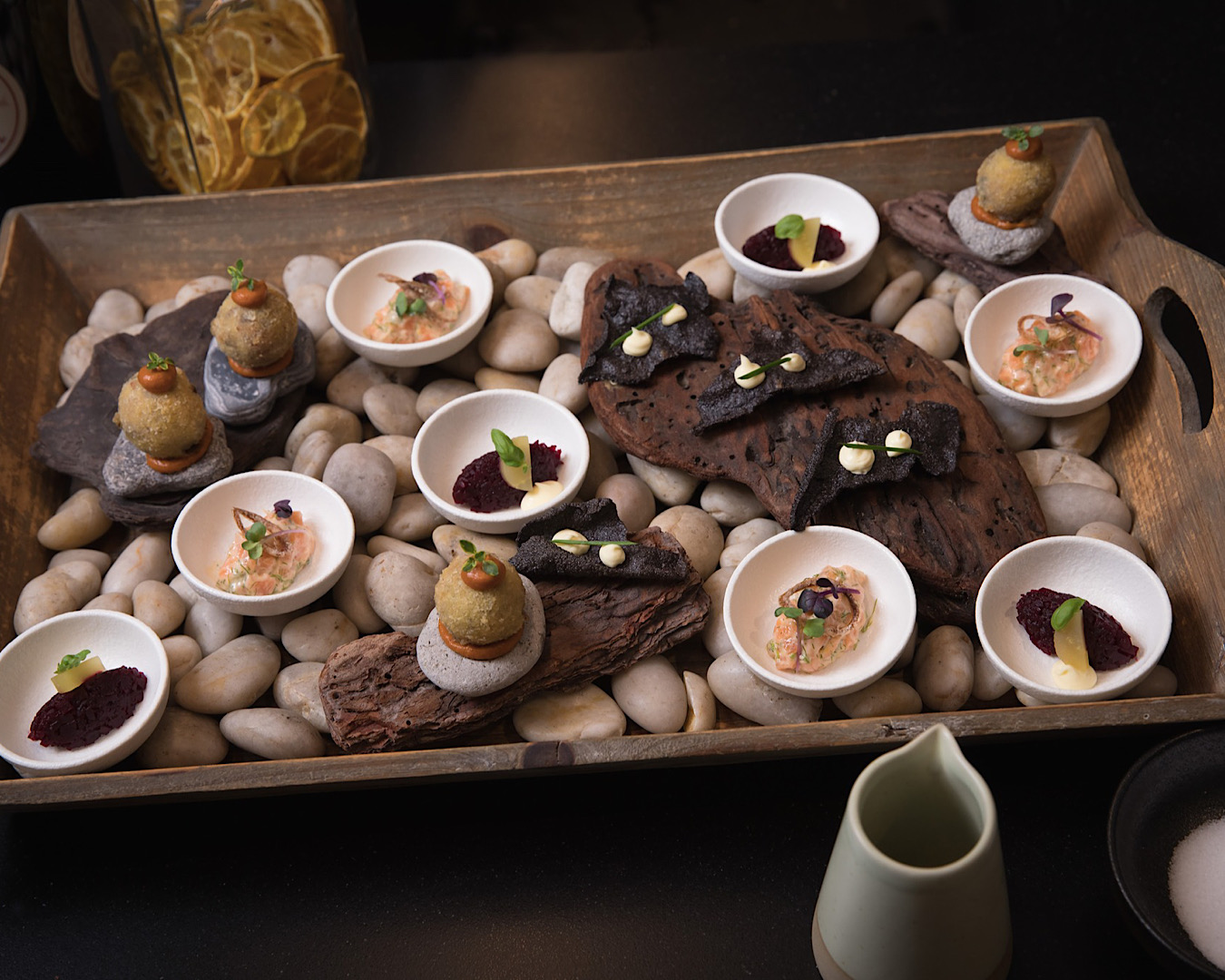 A beautiful earthen array of fine dining dishes created by Taupō private chef, Wild Roots Culinary Concepts. 