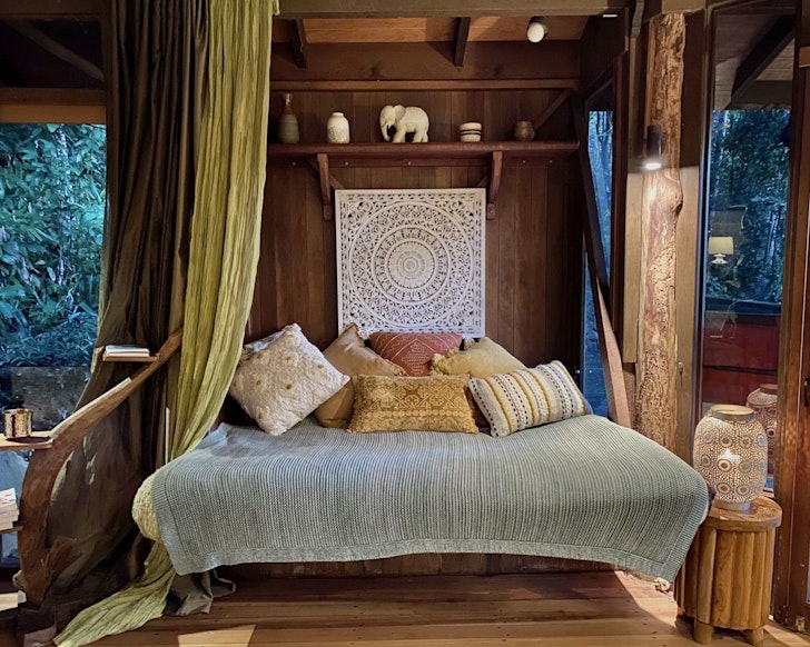 The bedroom at Currumbin Rainforest Villa best treehouse stays Queensland
