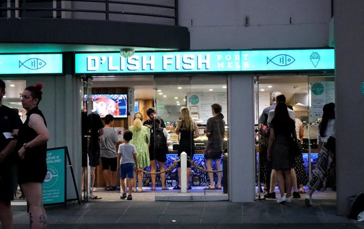 A fish and chips Melbourne shopfront with people lining up.