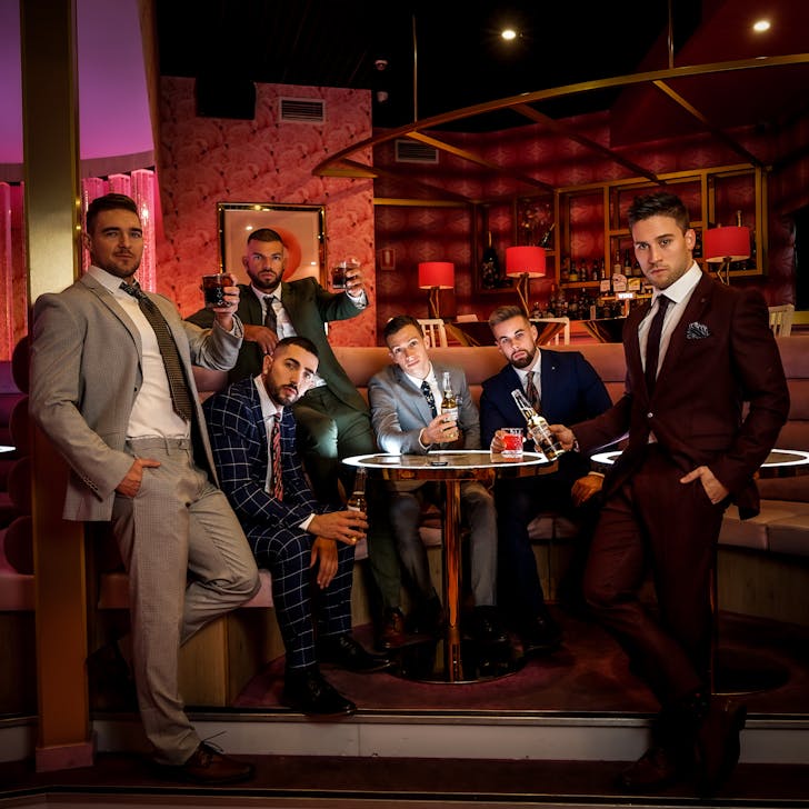 a group of men in suits