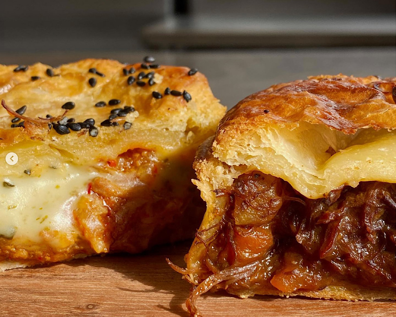 A mouthwatering cross-section of a pie absolutely packed to the brim with meat filling. 