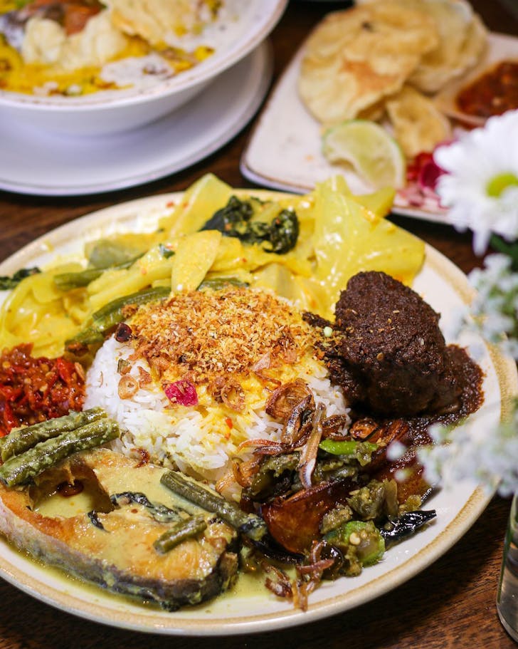 A plate of Nasi Lemak with Rendang at a Indonesian restaurant Melbourne