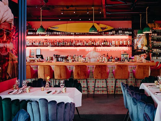 the interior of a vibrant indian restaurant in byron 