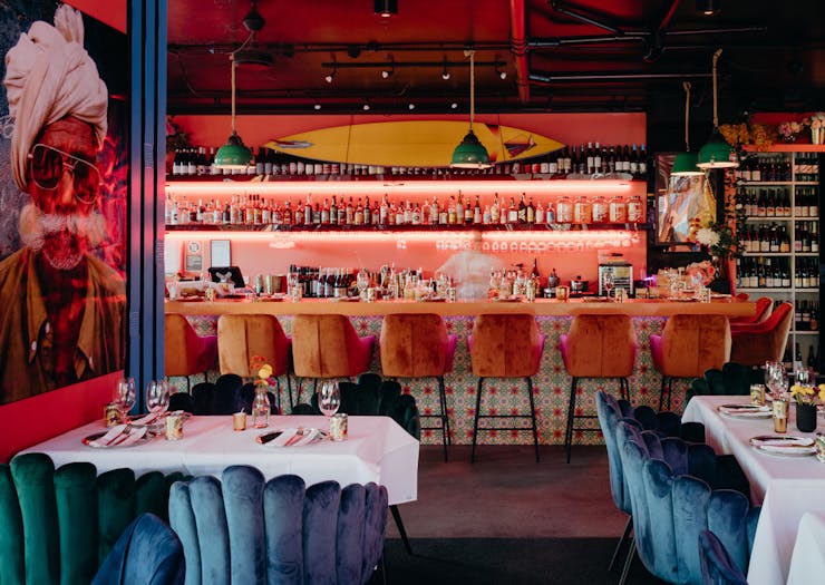 the interior of a vibrant indian restaurant
