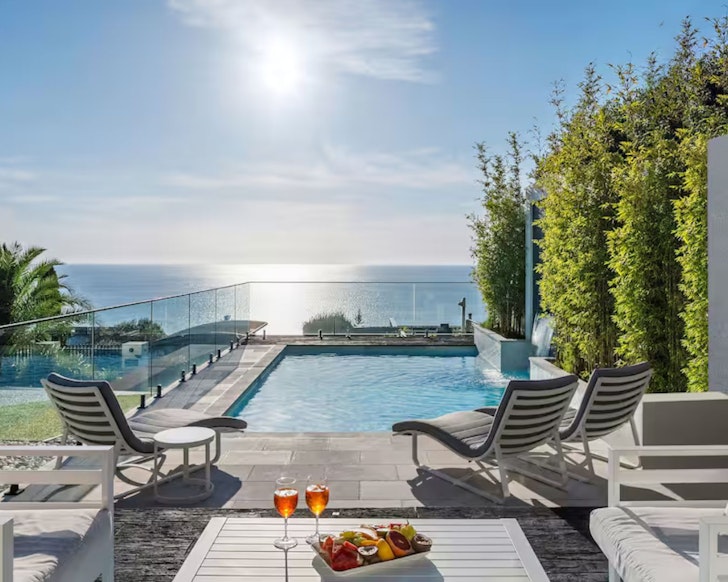 The pool with a sea view at Deja View one of the best beach house Airbnbs Victoria