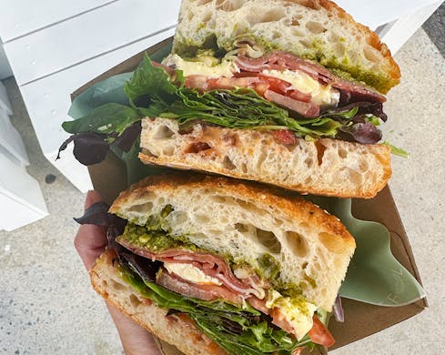 a sandwich stuffed with fillings