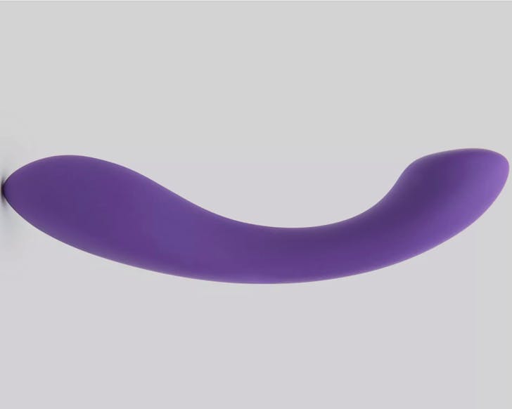 A purple silicone sex toy thatâs slightly curved with one thicker end and one tapered end. 